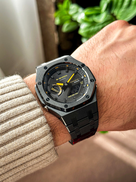 G-SHOCK CasiOak Potpuno crna - sa crno žutim brojčanikom sata